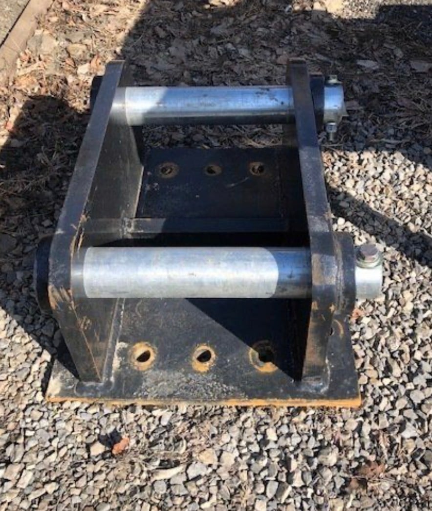 Black custom mount on gravel