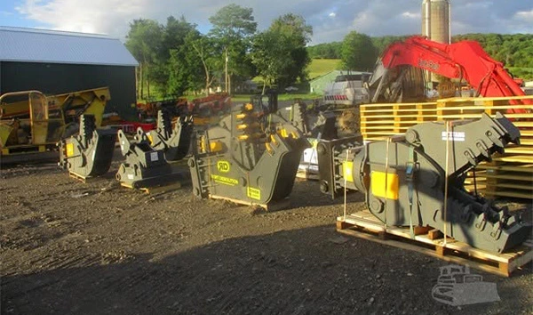 Concrete-Pulverizers displayed within a equipment yard.