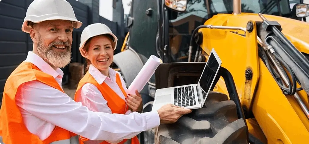 Man and women working on a demolition equipment
